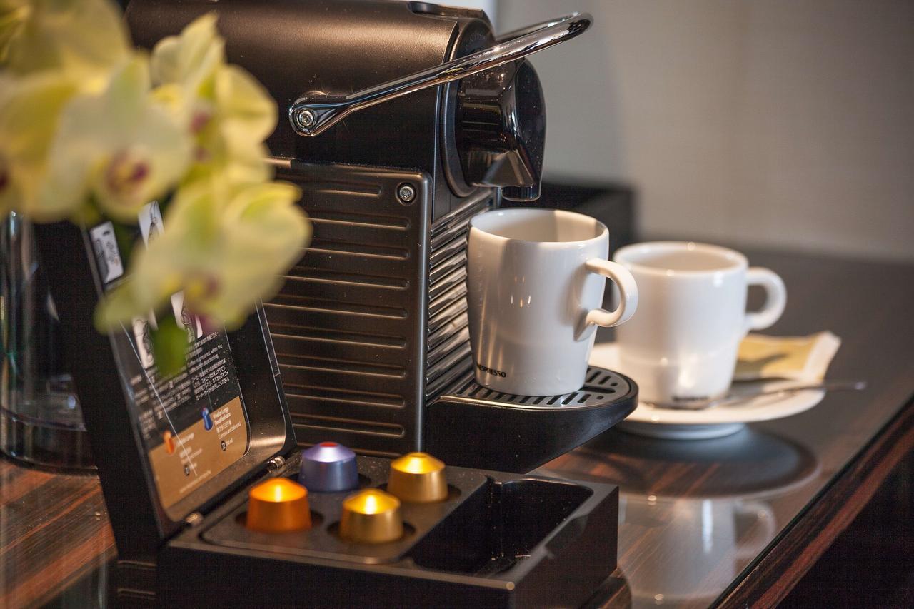 The Grand Hotel Taipei Exterior foto A Nespresso machine